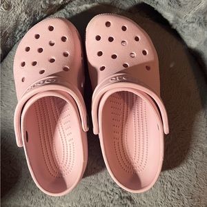 gently used crocs in pink